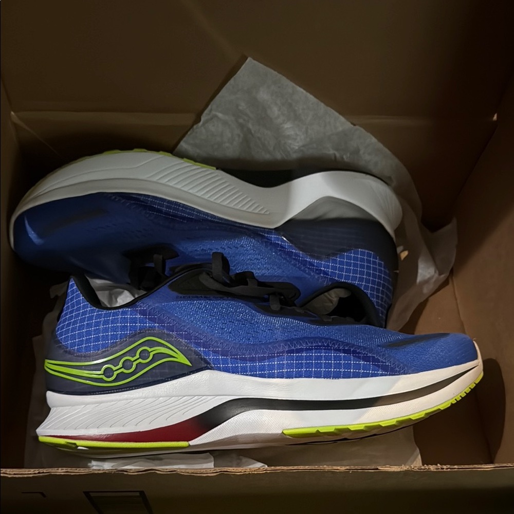 - Saucony Blue and Green Athletic Shoes with Streamlined Design used